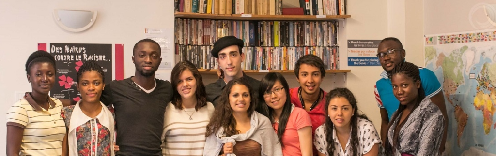 A group of international students posing in Inflexyon foyer