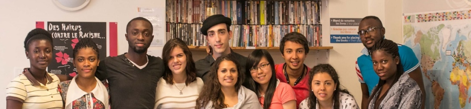 A group of international students posing in Inflexyon foyer